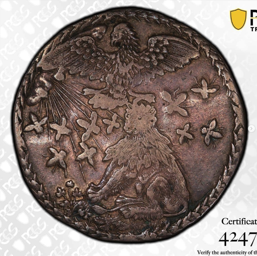 1599 AR Reichsthaler - obverse: Welf lion seated under a swarm of wasps / mosquitoes, sun's rays from upper left, the Imperial double-headed eagle of Rudolf II hovering protectively above / reverse: ten-shield arms of Brunswick-Lüneburg, legend HENRICUS IULIUS D G E HA D BET L 1599 PPC - obverse