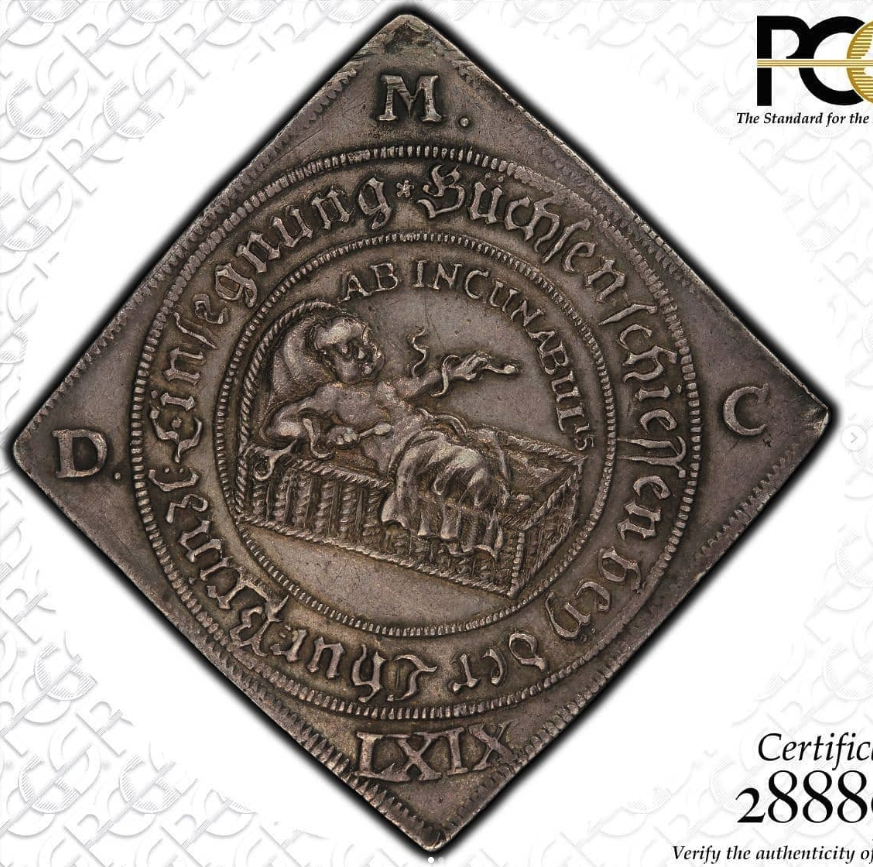 1669 AR Klippe Thaler (square / lozenge planchet) - Davenport-7632 - obverse: swaddled infant prince in cradle beneath the Hand of God emerging from clouds with the legend AB INCUNABULIS ('From the cradle'), within an inner circle, surrounded by the Saxon arms and the German legend EINSEGNUNG SÜCHSEN SCHIESSEN BEY DER TAUFFE / reverse: crowned monogram of Johann Georg IV beneath the Saxon shield, German legend naming the prince Johanns Georg der Vierte, Hertzog zu Sachsen, with the year LXIX (1669) at base - obverse